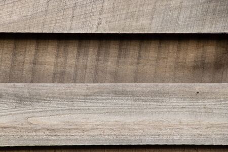 background of a wooden old board closeup in the afternoonの写真素材