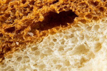 piece of bread close-up in daylight macro photoの写真素材