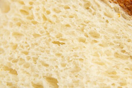 piece of bread close-up in daylight macro photoの写真素材