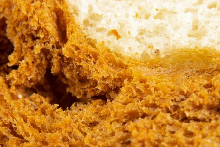 piece of bread close-up in daylight macro photoの写真素材