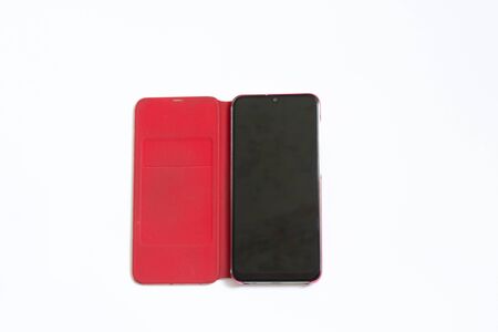 touch phone in a case on a white backgroundの写真素材