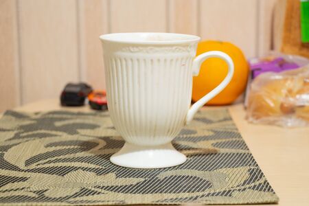 cup of tea and cookies on the table in the morning for breakfastの写真素材