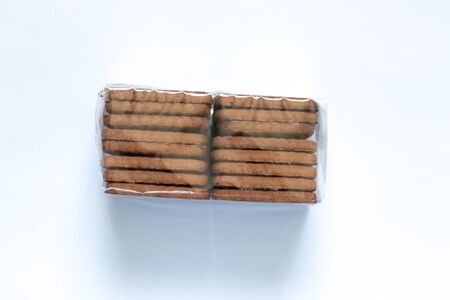 chocolate chip cookies in a stack on a white backgroundの写真素材