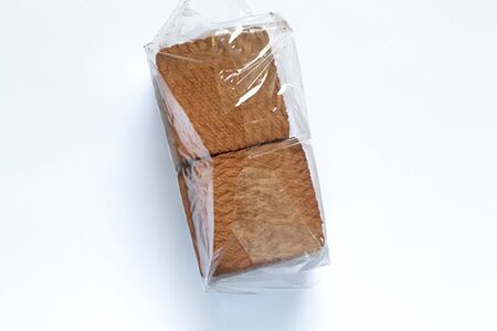 chocolate chip cookies in a stack on a white backgroundの写真素材