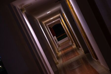long straight corridor of a hotel hotelの写真素材