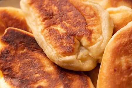 homemade fried pies with potatoes on a plateの写真素材