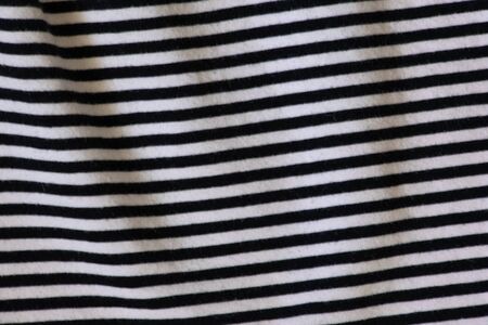 black and white striped cotton fabric backgroundの写真素材
