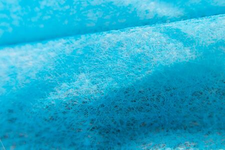 blue gauze medical mask macro photoの写真素材