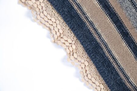 knitted multi-colored fabric sweaters on a white backgroundの写真素材