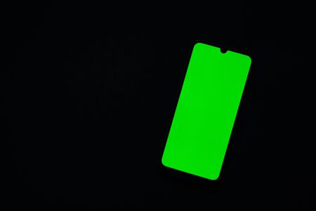 touchscreen phone with green screen on isolated backgroundの写真素材