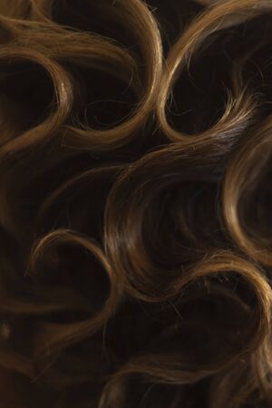 hair curly brown hair as background