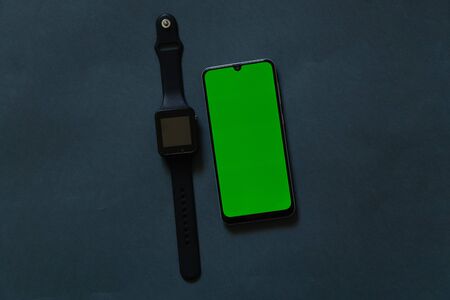 touchscreen phone with green screen and smart watchの写真素材
