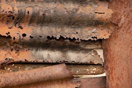 rusty holey fence as backgroundの写真素材