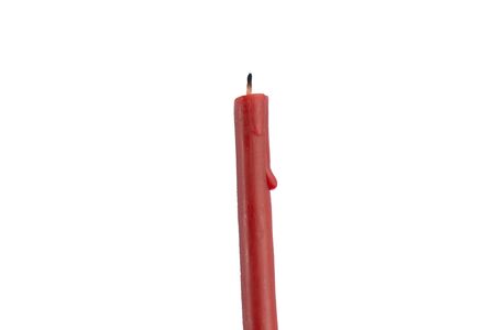church red wax candle on white backgroundの写真素材