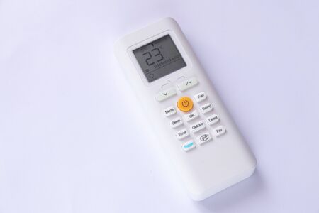 white remote control from air conditioner on a white backgroundの写真素材