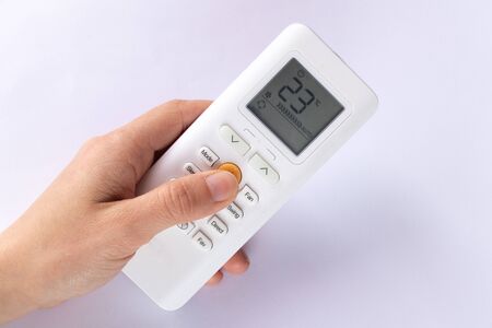 white remote control from air conditioner on a white backgroundの写真素材