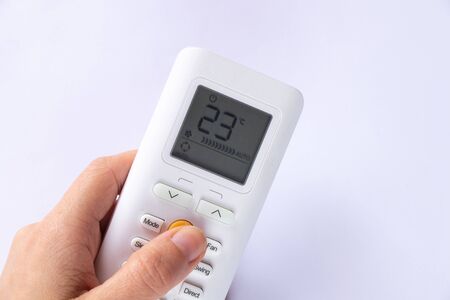white remote control from air conditioner on a white backgroundの写真素材