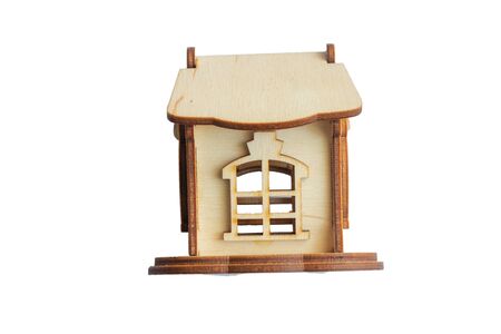 wooden small toy house on a white backgroundの写真素材