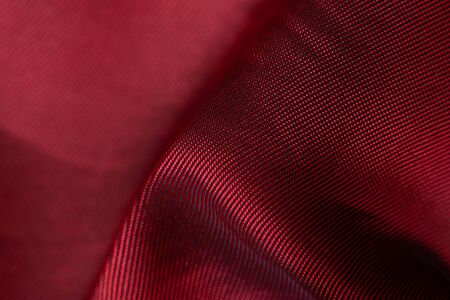 Background silk dark red macro photoの写真素材