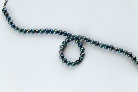 pearl female beads on an isolated backgroundの写真素材