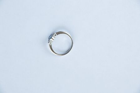 white gold ring on a white backgroundの写真素材