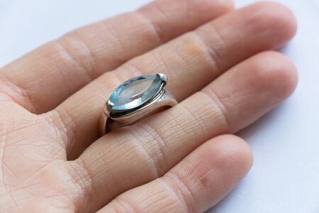 white gold ring on a white backgroundの写真素材