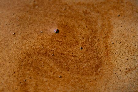 coffee foam in a cup of hot coffeeの写真素材