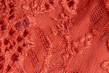 orange lace openwork on a white backgroundの写真素材
