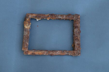 rusty frame on a gray background, place for textの写真素材