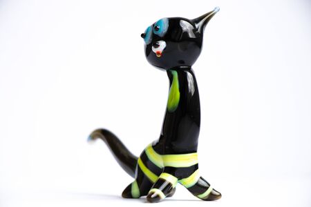 figurine black cat made of glass on a white background handmadeの写真素材