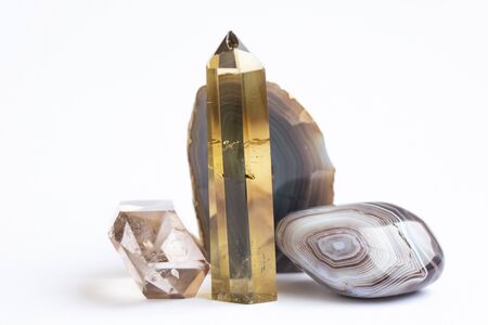 two natural quartz crystals on a white background