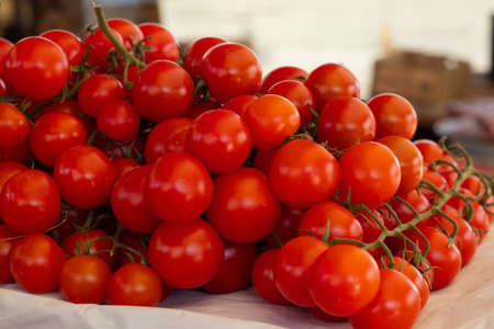 cherry tomatoes in a bazaar in a shop window in Ukraineの写真素材