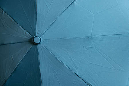 light blue umbrella as a background close upの写真素材