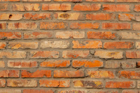 brown brick wall as a background close-upの写真素材