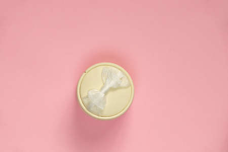 gift box with bow on pink background for ringの写真素材