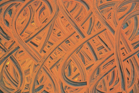 watercolor brown paint strokes on glass as background, creativity