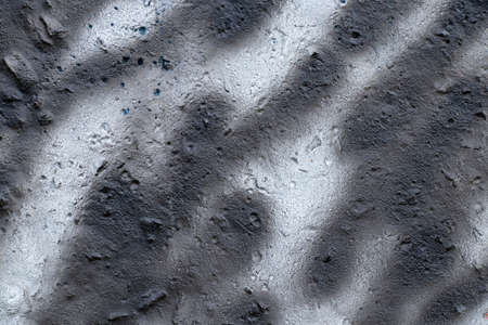 concrete wall painted with bright gray paints as background