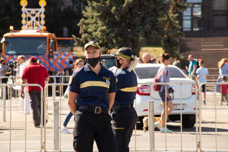 Ukraine Dnipro - September 12, 2020 - two police girls in medetsyn masks during the days of...