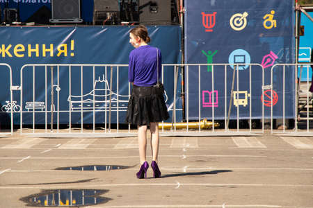 Ukraine Dnipro 10 21 2020 - a girl is standing in vyupki and on koblocks they carried scenes on the square during quarantine, a city holiday, people in quarantineのeditorial素材