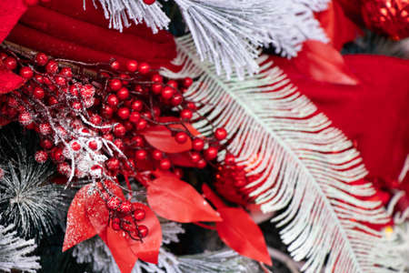 christmas tree with red and white balls in the snow, new year