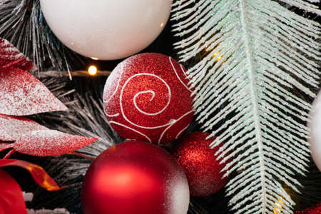 christmas tree with red and white balls in the snow, new yearの写真素材