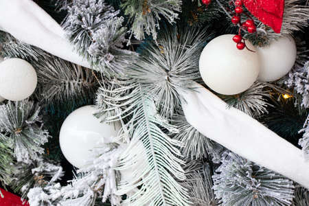 christmas tree with red and white balls in the snow, new yearの写真素材