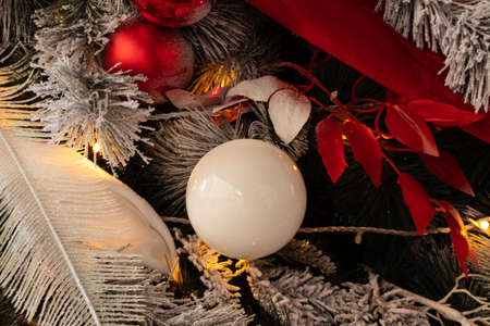 christmas tree with red and white balls in the snow, new yearの写真素材
