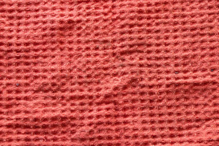 waffle towel red crumpled as background close-upの写真素材
