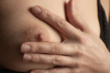 small female breasts close upの写真素材