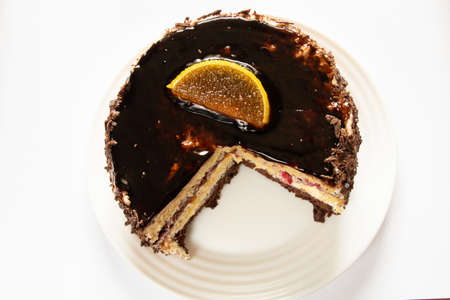chocolate cake on a plate on a white plate close upの写真素材