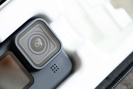 Ukraine Dnepr 01/06/2021 - Camera Go pro 9 lies on a wooden table, a review of the new action cameraのeditorial素材