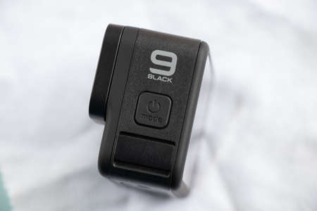 Ukraine Dnipro 01/06/2021 - Camera Go pro 9 lies on an isolated background, a review of the new action cameraのeditorial素材