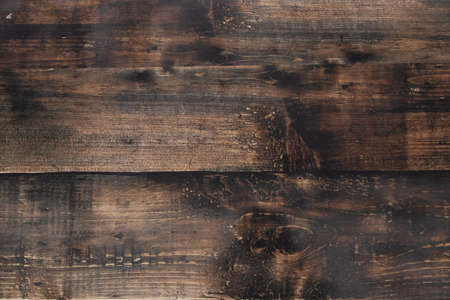 brown wooden wall as background close upの写真素材