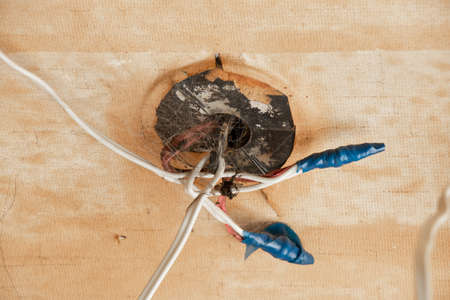 replacement of electric lighting and wires on the ceiling in the apartment, repairの写真素材
